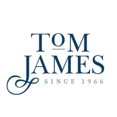 Logo of Tom James Company